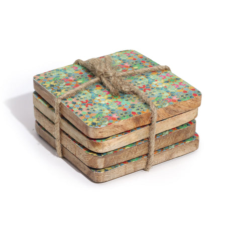 The Window, Milford Haven square mango wood coasters with a colourful Mediterranean tile pattern tied with twine
