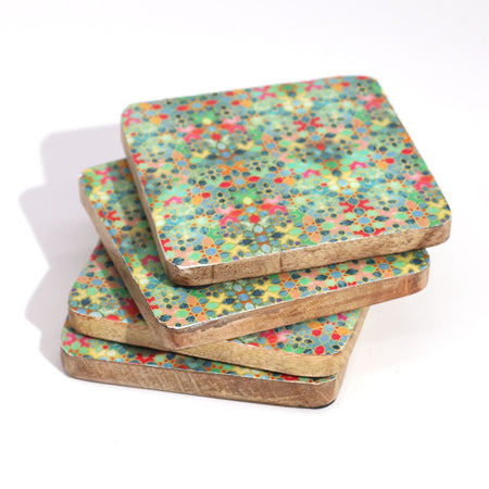 The Window, Milford Haven set of four square mango wood coasters with a vibrant Mediterranean tile pattern.