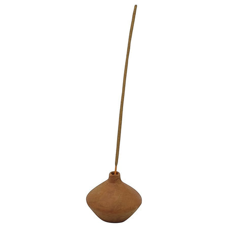 The Window, Milford Haven handmade terracotta round incense stick holder with a single incense stick inserted.