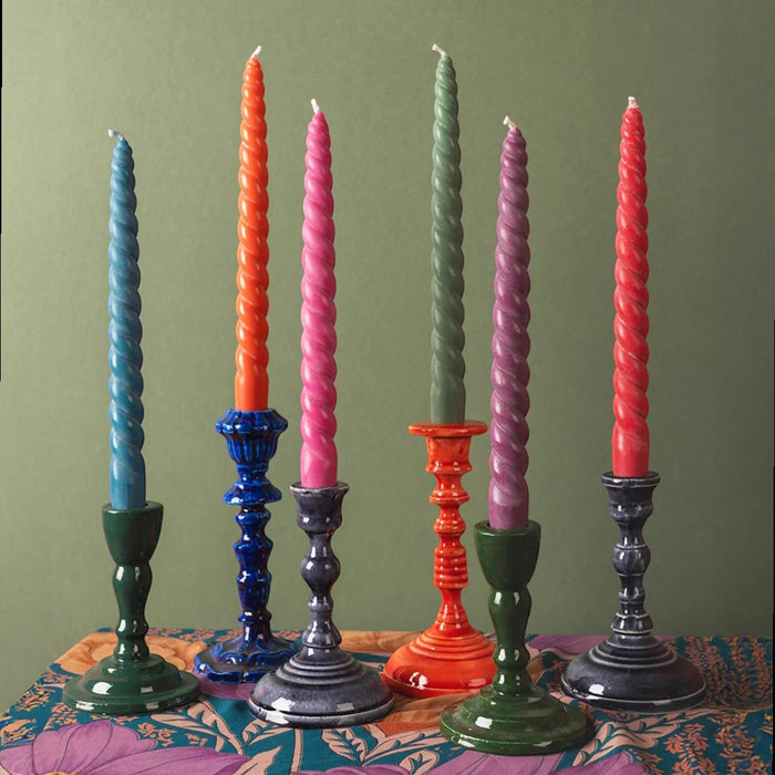 The Window, Milford Haven set of six colourful twisted stearin wax dinner candles in various twilight-inspired shades.