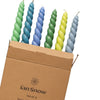 The Window, Milford Haven set of six twisted Coast dinner candles in earthy blue and green tones in a cardboard box.