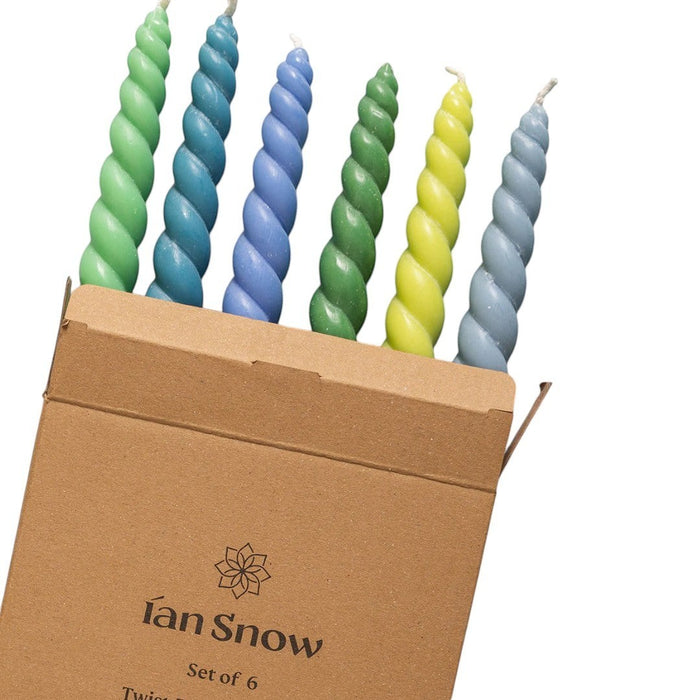 The Window, Milford Haven set of six twisted Coast dinner candles in earthy blue and green tones in a cardboard box.