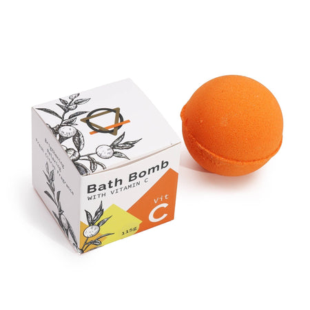 The Window, Milford Haven Vitamin C bath bomb in bright orange next to its white illustrated product box.