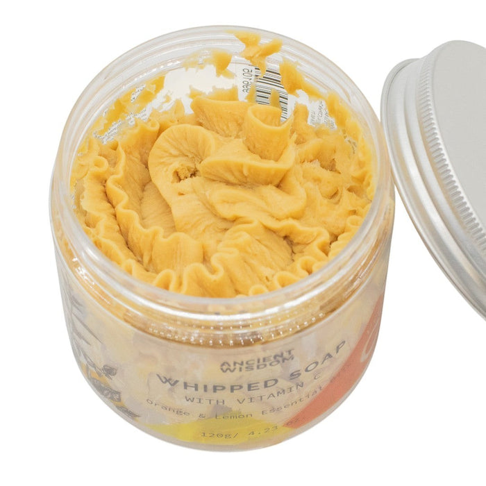 The Window, Milford Haven Vitamin C whipped soap in a clear jar with a creamy yellow citrus-scented texture.