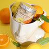 The Window, Milford Haven whipped soap jar with Vitamin C, orange, and lemon oils in a decorative head-shaped bowl.
