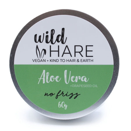 The Window, Milford Haven Wild Hare Aloe Vera solid shampoo bar in a 60g travel tin for frizz-free hair care.