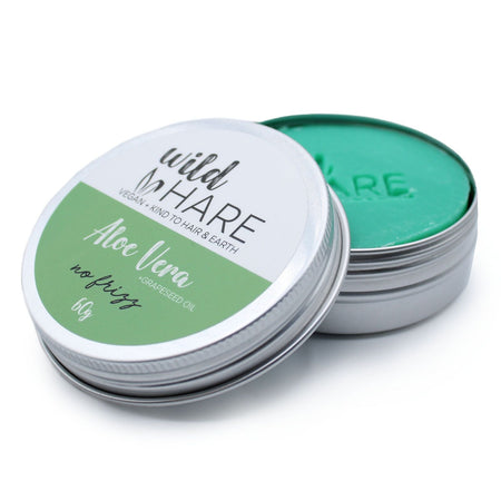 The Window, Milford Haven Wild Hare Aloe Vera solid shampoo bar in a round metal travel tin with green branding.