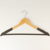 The Window, Milford Haven wooden clothes hanger with non-slip dark grey sections and a sturdy metal hook.