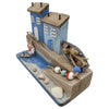 The Window, Milford Haven wooden coastal ornament featuring blue cottages, a miniature boat, and real seashells.