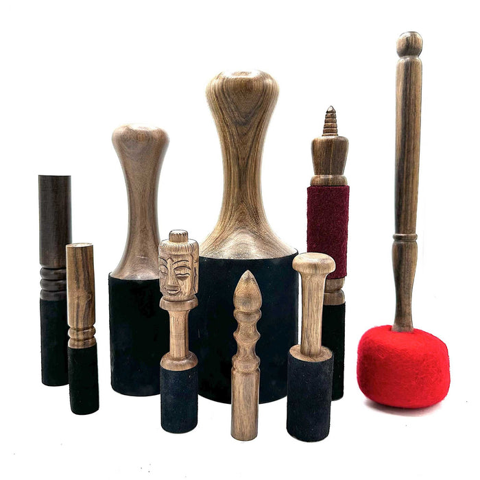 The Window, Milford Haven collection of wooden Terminalia Elliptica gong sticks and singing bowl mallets from Nepal.