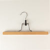 The Window, Milford Haven wooden grip bar hanger for trousers and scarves with a sturdy metal hook and clamping bars.