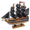 The Window, Milford Haven small wooden pirate ship model with black fabric sails featuring skull and crossbones.