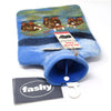 The Window, Milford Haven wool felt hot water bottle cover featuring a hand-crafted Highland Cow design in blue tones.