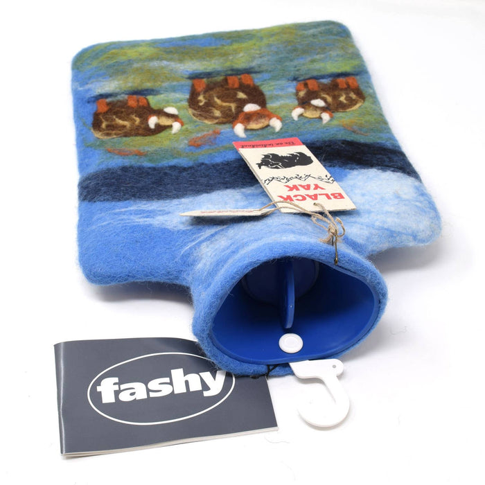 The Window, Milford Haven wool felt hot water bottle cover featuring a hand-crafted Highland Cow design in blue tones.