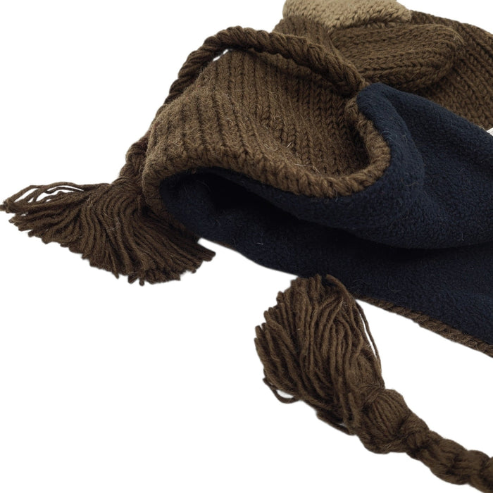 The Window, Milford Haven handmade brown wool reindeer hat with soft navy fleece lining and braided ear-flaps.