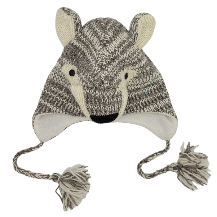 The Window, Milford Haven handmade wool wolf hat with fleece lining, ear-flaps, and braided tassels in grey and white.
