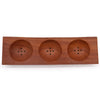 Rectangular naseberry wood soap dish with three circular compartments and small holes for soap drainage