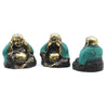 Three brass buddhas with turquoise robes in see no evil hear no evil speak no evil poses