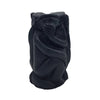 Black carved wooden monkey figurine with textured matte finish showing three wise monkeys theme