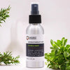 A sleek silver spray bottle with black nozzle labeled ancient wisdom aromatherapy mist thyme essential oil diffuser blend