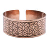 Copper Tibetan mantra cuff bracelet with an extra wide band and detailed flower of life engraving