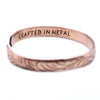Copper tibetan mantra bracelet with narrow textured wave pattern and crafted in nepal engraving inside