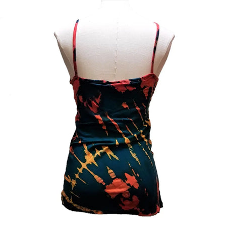 A dark teal tie-dye tank vest with spaghetti straps featuring bold red and orange splatter patterns on soft fabric