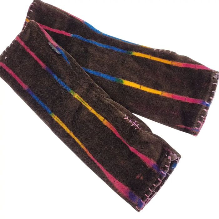 Brown velvet handwarmer gloves with vibrant rainbow stripes and decorative stitching in a tie-dye style design