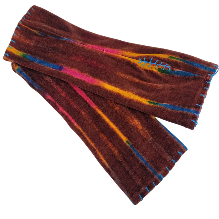 Brown velvet handwarmer gloves with vibrant tie-dye stripes and blue stitching for adult use