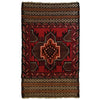 A traditional afghan mushwani rug with a red black geometric medallion and wool kilim-ended design