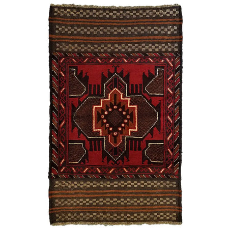 A traditional afghan mushwani rug with a red black geometric medallion and wool kilim-ended design