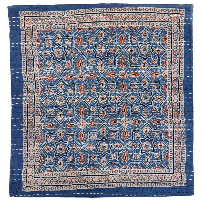 Traditional blue kantha cushion cover with quilted geometric and floral patterns in red black and white for standard cushions