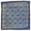 Blue kantha cushion cover with intricate white and black embroidered swirling patterns on a standard cushion