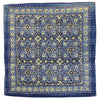 Traditional blue kantha cushion cover with blue and yellow geometric patterns on a standard cushion cover