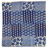 A traditional blue kantha patchwork cushion cover with stitched floral and geometric fabric squares and orange thread details