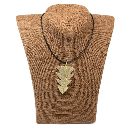 Gold leaf-shaped tree leaf necklace pendant on a black cord showing a simple leaf necklace design