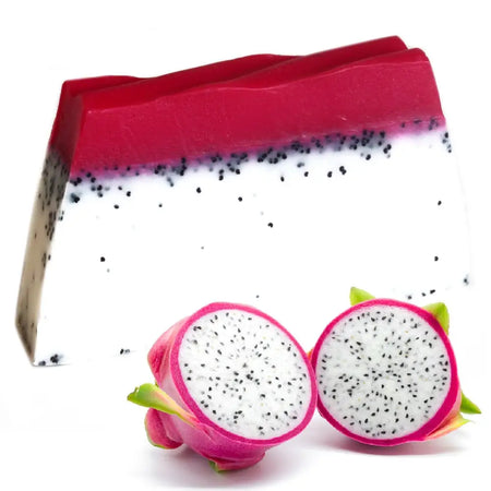 A vibrant red and white dragon fruit soap loaf with black seeds resembling tropical fruit scents and fresh layers