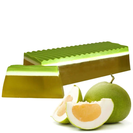 Green and gold layered pomelo soap loaf with a textured wavy top surface for tropical paradise cleansing