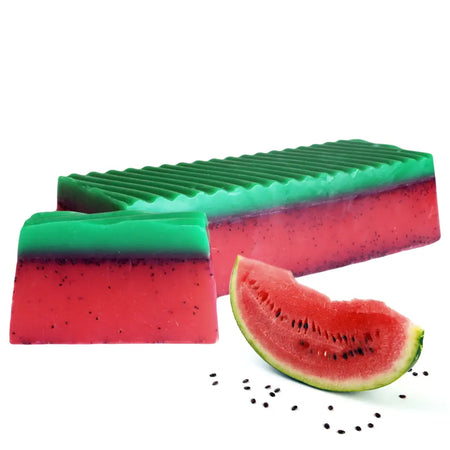 Tropical paradise soap loaf with watermelon design in red and green featuring black seed details and tropical fruit scents