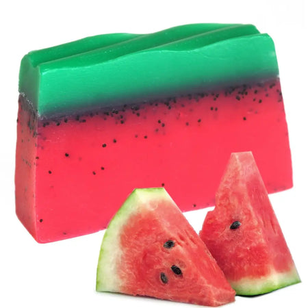 Tropical paradise soap loaf with vibrant layered watermelon design in green rind and red flesh with black seeds scented with tropical fruit scents