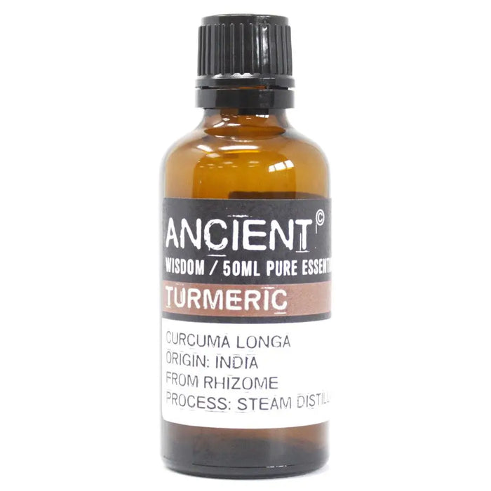 A 50ml amber glass bottle of turmeric essential oil with a black ribbed cap and label showing origin from india