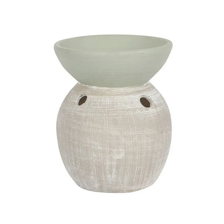 A matte white two-tone ceramic oil burner with a textured brush-stroked finish and small side vents