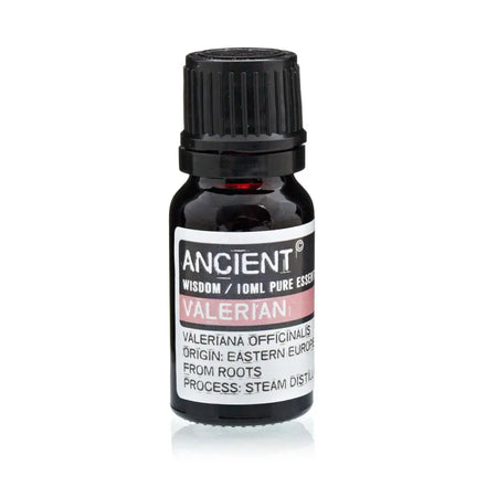 A sleek black glass bottle with a ribbed cap labeled ancient wisdom valerian valerian essential oil 10ml