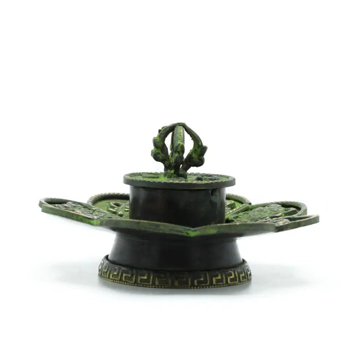 Antique-style verdigris brass incense holder with green patina, ornate leaf base, and central spout finial design