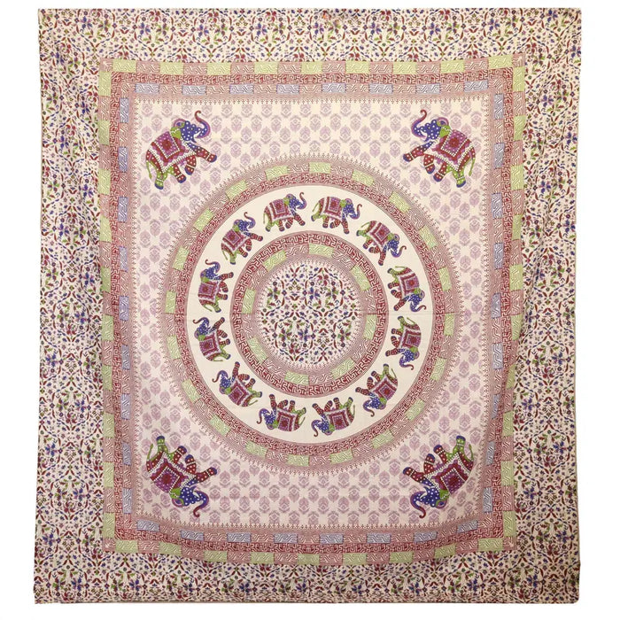 A wall hanging with a purple and green elephant mandala design on cream fabric useful as a beach spread