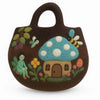 Brown felted bag with a blue polka-dotted mushroom house, bees, flowers, and a fairy in a fairy garden design