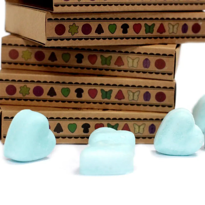 Light blue heart shaped palm wax wax melts in a box of 6 scented with nagchampa fragrance