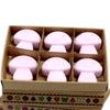 Pink mushroom-shaped wax melts made from palm waxes in a cardboard box ylang ylang scent box of 6