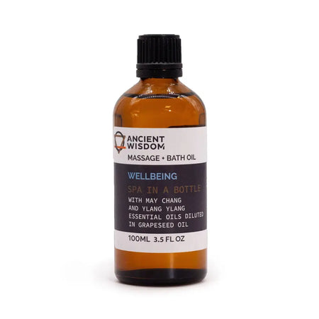 A amber glass bottle of ancient wisdom wellbeing massage oil with essential oils diluted in grapeseed oil 100ml