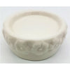 White ceramic candle stand with a floral embossed pattern around the rim made of ceramic material